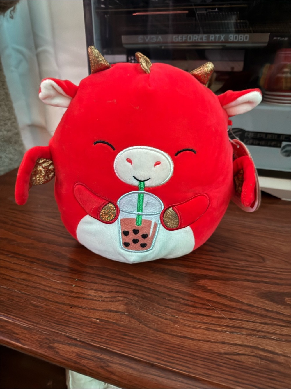 Squishmallows Red Plush Cow with Gold Accents and Bubble Tea Embroidery